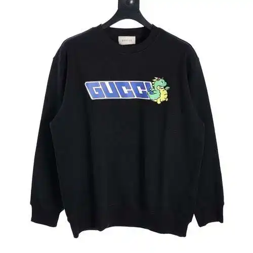 GU*CCI sudadera con cuello redondo y estampado de dinosaurios