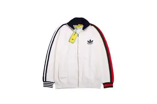Chaqueta de punto con trébol con articulación GU*CCI 23SS