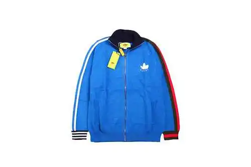 Chaqueta de punto con trébol con articulación GU*CCI 23SS