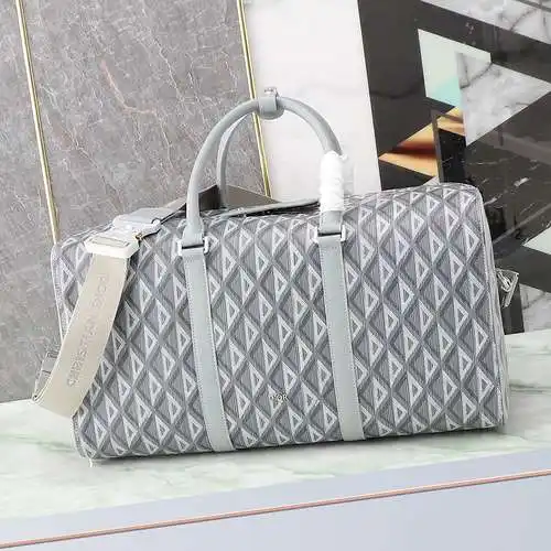 La bolsa de viaje de D está hecha de cuero original importado de primera calidad, versión réplica de