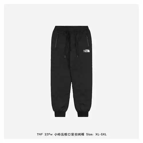 TNF 22Fw pantalones acolchados con bolsillo laminado y etiqueta pequeña