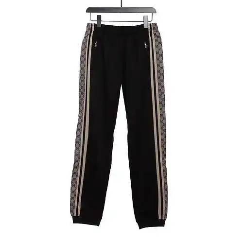 GU*CCI Gucci pantalones de traje clásicos con estampado de serpiente