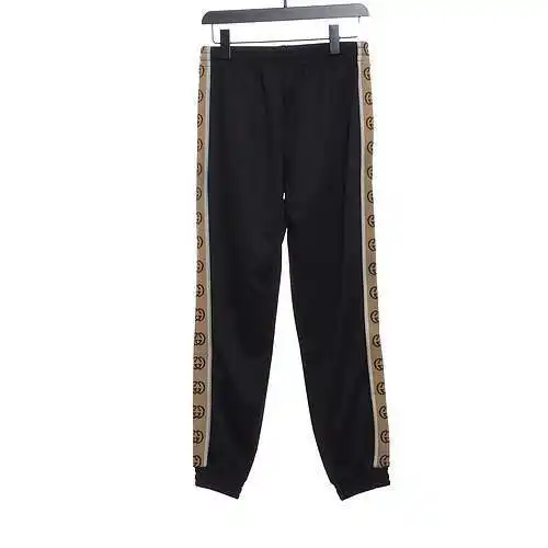 GU*CCI Gucci pantalones de traje con cintas reflectantes