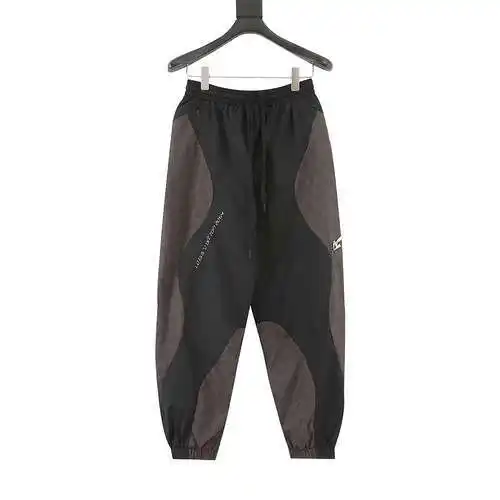 pantalones deportivos con logo y patchwork para presbicia 1V