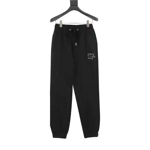 pantalones CD con pernera vertical y logo bordado en toalla
