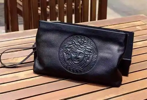 Bolso tipo clutch para caballero, elaborado en piel vacuna original importada, alta calidad, entrega