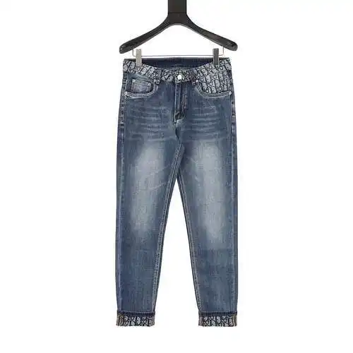 CD jeans with logo printed all over the pockets