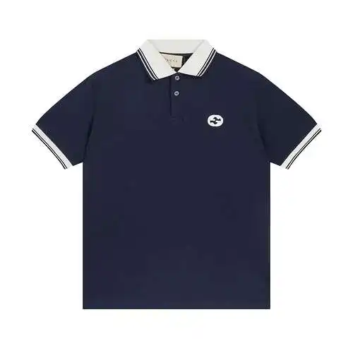Gucci. Piqué de algodón elástico azul oscuro Parche con G entrelazadas redondas bordadas Cuello tipo