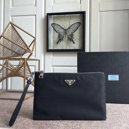 Bolso de mano PRA@DA para hombre, elaborado en piel vacuna original importada, alta calidad, entrega