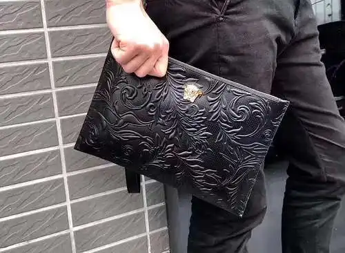 Bolso tipo clutch para caballero, elaborado en piel vacuna original importada, alta calidad, entrega