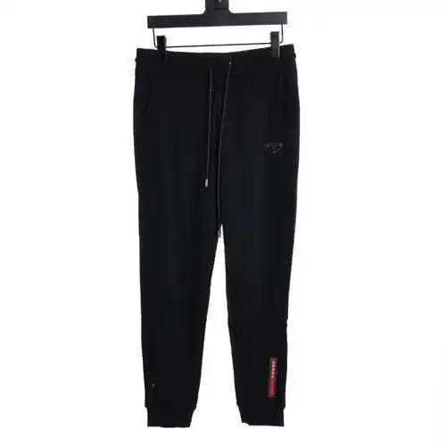 PRD triangle hem red tape trousers