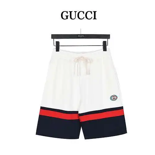 G Gucci pantalones cortos con bordado de doble G y patchwork a rayas