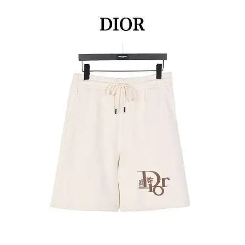 Shorts CD Dior con letras bordadas en el bajo