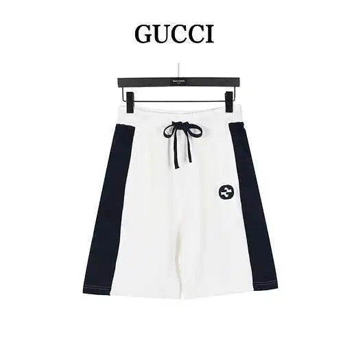 Pantalones cortos con bordado de doble G y patchwork de G/Gucci