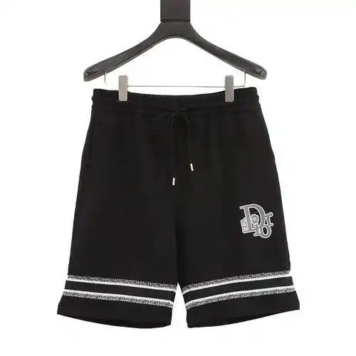 Shorts CD con logo bordado y patchwork en el dobladillo