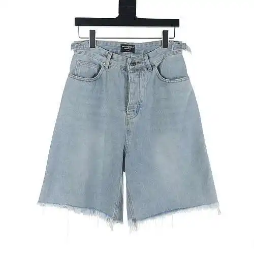 Balenciaga BLCG pantalones cortos de mezclilla con borlas desgastadas
