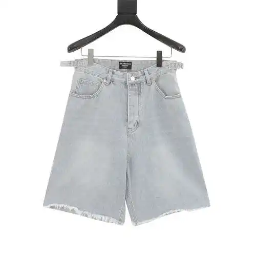 BLCG shorts de mezclilla con dobladillo desgastado y borlas