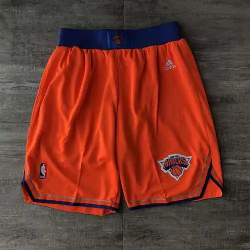 Knicks pantalones cortos naranjas