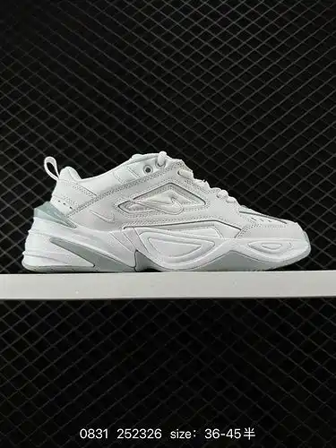 La parte superior artesanal de cuero retro, de moda y de alta calidad de 3 Nike Air Monarch m2k, con