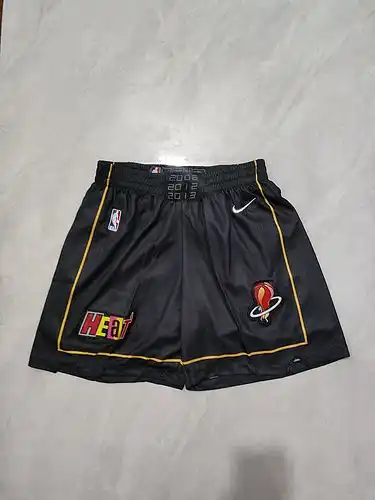 Pantalones de bola negra caliente para niños