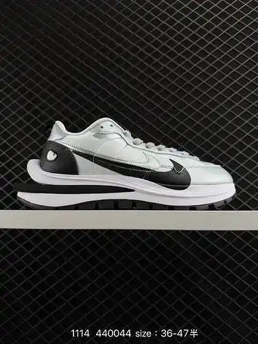 El sistema de media yarda estándar real de zapatos masculinos y femeninos de la serie de deconstrucc