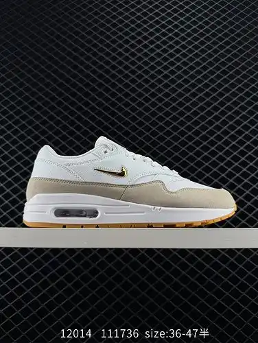 Las zapatillas amortiguadoras y resistentes al desgaste del colchón de aire Nike Air Max 1yu, de cla