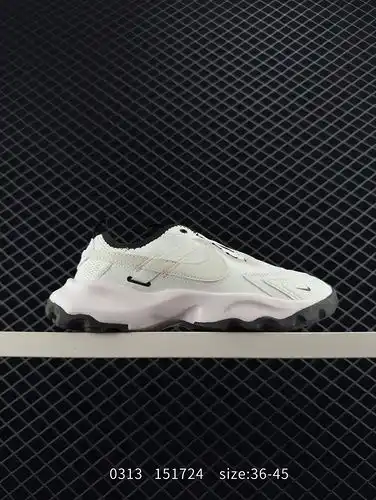 The new Nike TC 7900 sports shoe is a dad shoe, with interwoven straps and hooks, as well as its rou
