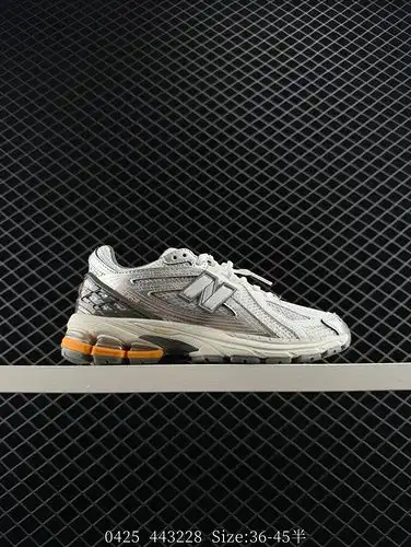 El New Balance M1906R serie retro papa antideslizante y resistente al desgaste zapatos de carrera de