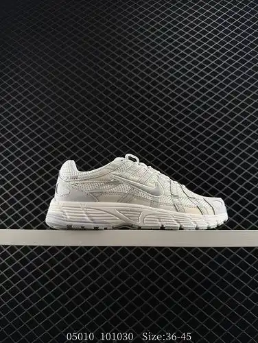 The Nike P-6000 running shoe features red hooks on both the inside and outside, made of breathable m