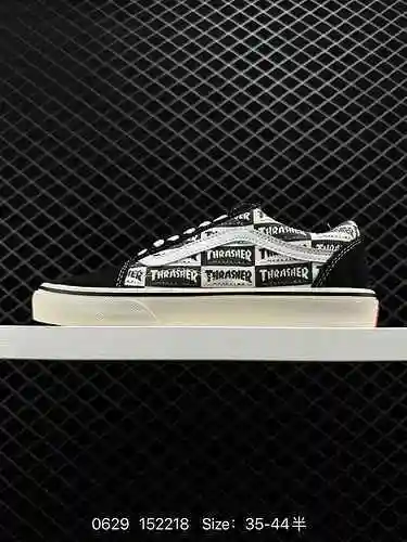 9 VANS zapatos de lona con logo de corte bajo y estampado de letras en blanco y negro Talla: 36 36.5