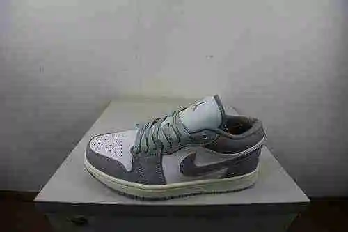 Jordan 1ª generación corte bajo gris 36-46
