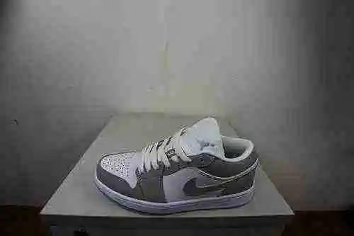 Jordan 1ª generación corte bajo gris 36-46