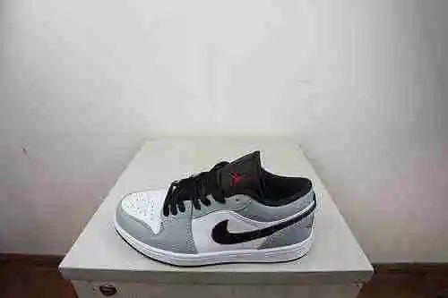 Jordan 1ª Generación Low Top Ceniza 36-46