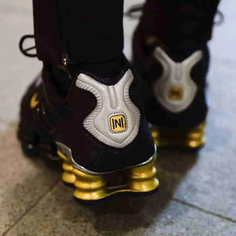 Neymar-Nike-Shox-TL-Black-Gold-BV1388-001-Release-Date-2.webp