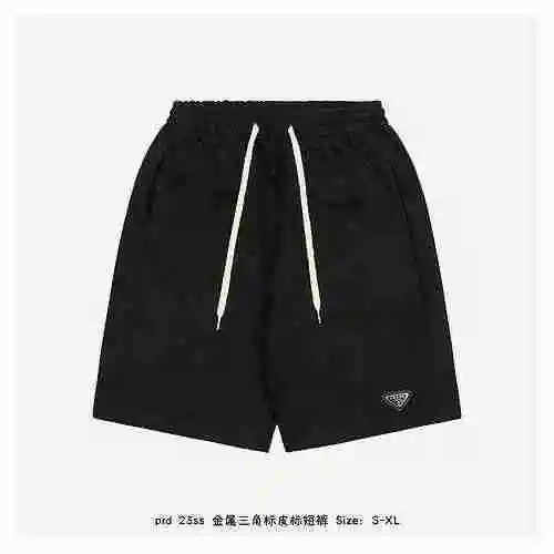 Pantalones cortos con etiqueta de cuero triangular metálico PRD 23SS