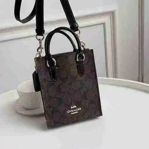 El bolso adopta piel de vaca original importada y una bolsa de regalo de entrega de alta calidad. Ta
