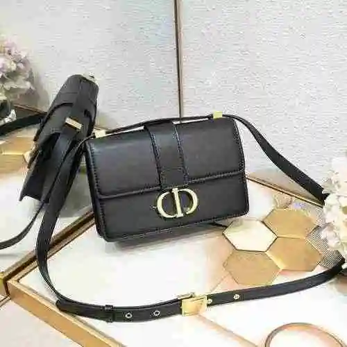 El bolso cruzado está hecho de piel de vaca original importada, con una bolsa de regalo de entrega d