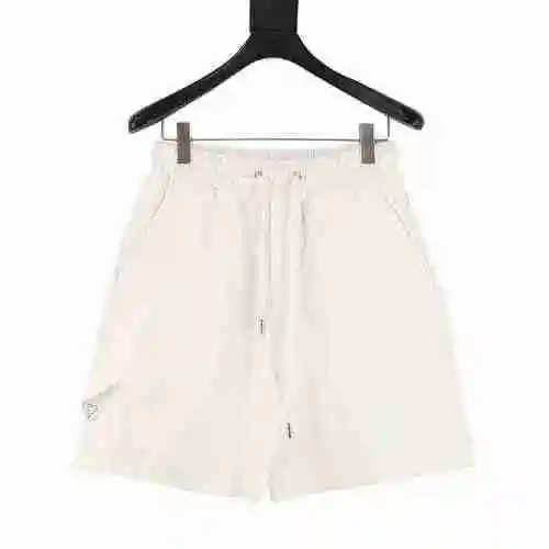 PRADA/Prada Pantalones cortos con bolsillo lateral triangular