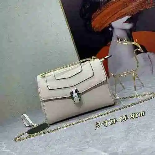 El bolso cruzado está hecho de piel de vaca original importada, con una bolsa de regalo de entrega d