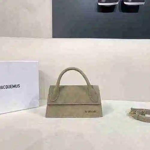 El bolso está hecho de piel de vaca original importada, con una bolsa de regalo de entrega de alta c