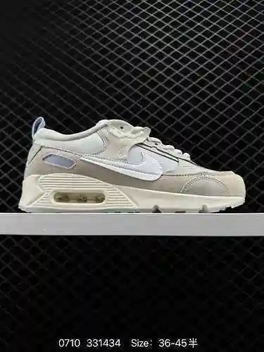 La parte superior de las zapatillas para correr con amortiguación de aire pequeña retro clásica 7 Ni