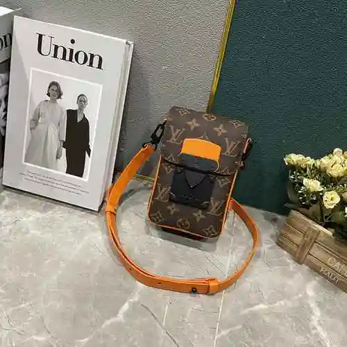 La bolsa para teléfono móvil exclusiva para hombres está hecha de material de lona importado, con un