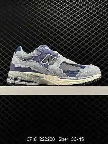 Los zapatos deportivos casuales estilo papá retro 140 New Balance NB New Balance ML2002 de la serie 