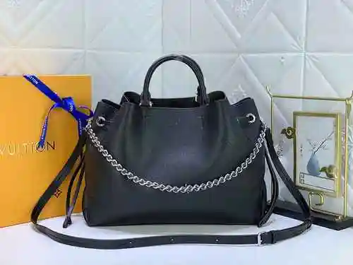 El bolso está hecho de piel de vaca original importada, con una bolsa de regalo de entrega de alta c