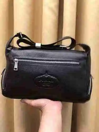 El bolso cruzado exclusivo para hombre está hecho de piel de vaca original importada y es una bolsa 