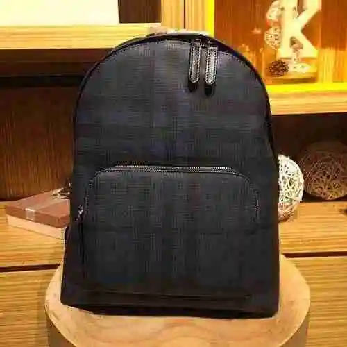 La mochila para hombre está hecha de piel de vaca original importada, con una bolsa de regalo de ent