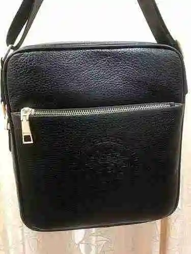 El bolso cruzado exclusivo para hombres está hecho de piel de vaca original importada y una bolsa de