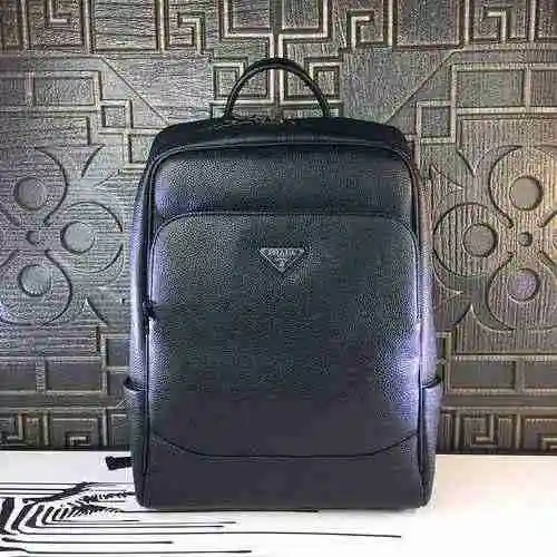 La mochila para hombre está hecha de piel de vaca original importada, con una bolsa de regalo de ent
