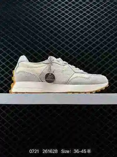 Los zapatos para correr deportivos casuales retro de la serie de nivel empresarial 140 New Balance M