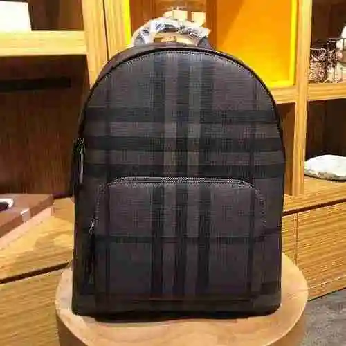 La mochila para hombre está hecha de piel de vaca original importada, con una bolsa de regalo de ent